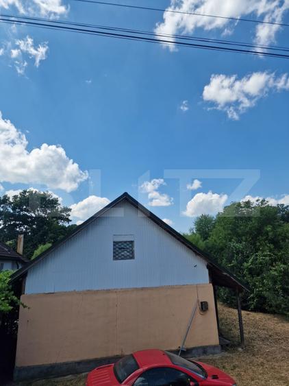 Casa cu 4 camere, 100 mp,si teren 700mp, zona Leoni