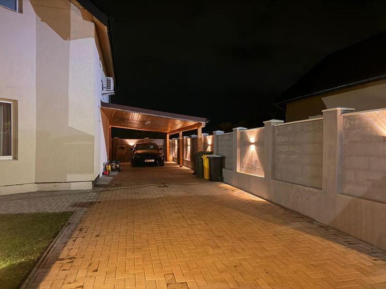 Casă modernă complet renovată, cu curte amenajată și sisteme inteligente
