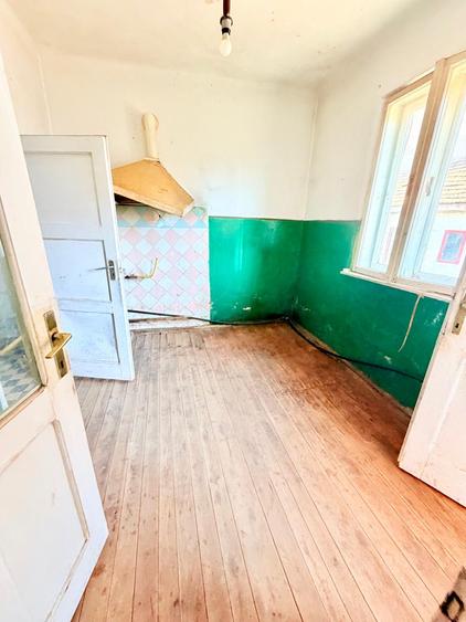 Casă de vânzare în zona Centrală -71 mp utili + 385 mp teren–150.000 €