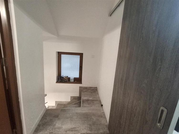 Casa individuala 3 camere 2 bai curte si garaj - zona Talmaciu