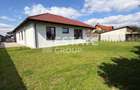 Duplex Mosnita Noua-finisat, curte amenajata