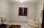 SE VINDE CASA FOARTE SPATIOASA CU TEREN 1200 MP IN LOCALITATEA CALUGARENI GR - 8