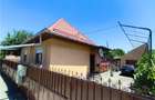 Casa pe un nivel renovata,curte individuala teren 780mp - 2