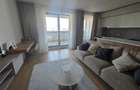 Apartament de 2 camere de închiriat — Aviatiei Tower cu loc de parcare inclus - 2