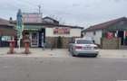 Se vând 3 spații comerciale funcționale + casă la roșu + teren  - 1