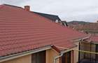 CASA DE VANZARE SATUL CATOLIC CARTIER 6 MARTIE ONESTI - 2