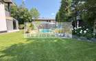 Casa P+1+M cu teren de 650 mp, piscina si curte complet amenajata