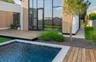 Casă Parter cu Design Minimalist și Piscină - 3