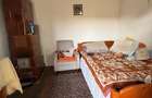 Casă de vânzare în Arcani, Gorj – teren și gospodărie - 4