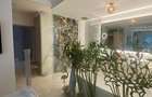 Apartament în Arcadia Domenii,230mp curte,3 parcări incluse