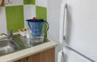 Garsoniera,Titan,Auchan,bl.reabilitat,MIXT,parter inalt/10,Amenajata,Libera - 1