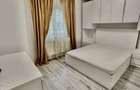 Apartament 1 camera - loc de parcare - mobilat utilat - liber - 3