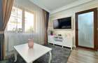 Apartament modern de vânzare, etaj 1, balcon închis, parcare privată - 11