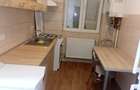 Inchiriez apartament cu 2 camere in zona centrala -langa Unicredit Bank - 7