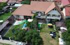 Casa 8 camere,teren 1027 mp, foisor si gratar,Micesti - 1
