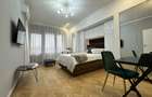 Apartament cu vedere la vârfurile copacilor din Parcul Grădina Cișmigiu - 3