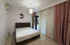 Apartament în Arcadia Domenii,230mp curte,3 parcări incluse