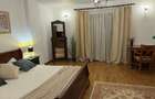 Apartament Central de inchiriat in bloc nou - 9