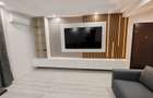 Prima inchiriere! Apartament modern + parcare in Cosmopolis  - 1