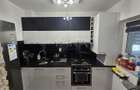 Apartament cu 2 camere si parcare  in zona centrala a localitatii - 1