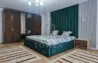 Casă individuală cu 2 apartamente și anexă generos de 100 mp