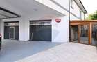 Proprietate premium în Filiași, locuință de lux cu spații comerciale - 39