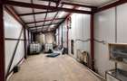 Proprietate industrială comercială de vânzare   11.574 mp teren, acces TIR-A7 - 9
