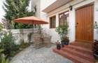 APARTAMENT 3/4 CAMERE PARTER// GRADINA - 1