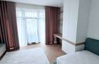 Casă de vânzare cu design contemporan și dotări premium