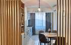 2 camere ,etaj 2 ,mobilat ultra modern - 1