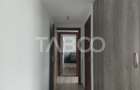 Casa in zona centrala 5 camere 2 bucatarii 3 bai curte comuna Cisnadie
