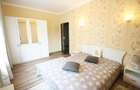 Apartament central cu acces la gradina si 2 locuri parcare - 10