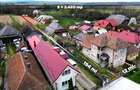 Casă din cărămidă cu teren generos de 2460 mp și anexe, în Borlești - 2