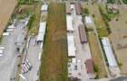 Proprietate industrială 5 hale, teren 21,105 mp, Santion, - 2