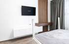 2 camere cu grădină proprie  și loc de parcare inclus. Mobilat. Rond Cristalului - 4
