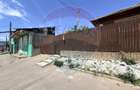 Teren 650 mp,  cu casa modesta, zona Blv Nicolae Romanescu - 2