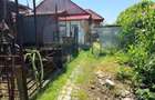 Teren 650 mp,  cu casa modesta, zona Blv Nicolae Romanescu - 5