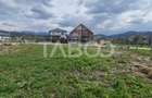 Teren intravilan cu utilitati 464 mp front 27 ml pentru casa Talmaciu - 1