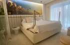 Apartament în Arcadia Domenii,230mp curte,3 parcări incluse
