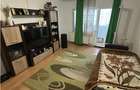 Decomandat cu 2 bai si 2 balcoane la etajul 1 bloc izolat - 12