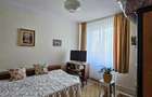 Apartament cu GRADINA SI ACOPERIS  MANSARDA DE VANZARE IN ONESTI ETJ 1 - 6