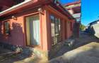 Proprietate deosebită în Buftea – casă P+1, teren 3.500 mp, magazin închiriat, l - 4
