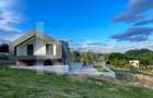 Casă arhitectură modernă cu panoramă spre Munții Făgăraș și Cetatea Cisnădioara