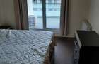 Dau in chirie apartament cu 2 camere si parcare subterana - 1