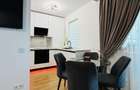 Apartament 2 camere + grădină proprie 70 mp + 2 locuri de parcare  - 12