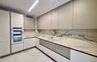 Parter cu gradina / Bloc boutique / 2 locuri de parcare - 4