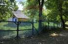 Teren intravilan mare cu casa veche In Buciumi langa Onesti