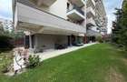Apartament în Arcadia Domenii,230mp curte,3 parcări incluse