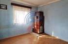 Casa Bradesti  teren  intravilan 7952 mp  deschidere 33 m la DE 70