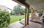 Casă individuală cu 4 dormitoare, grădină 850 mp și garaj dublu - 22
